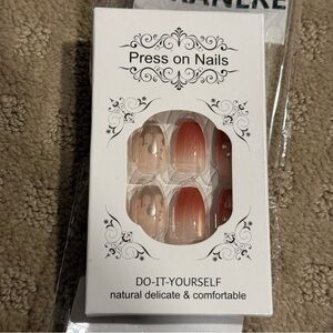 NIB- Silver and Redish Press On Nails